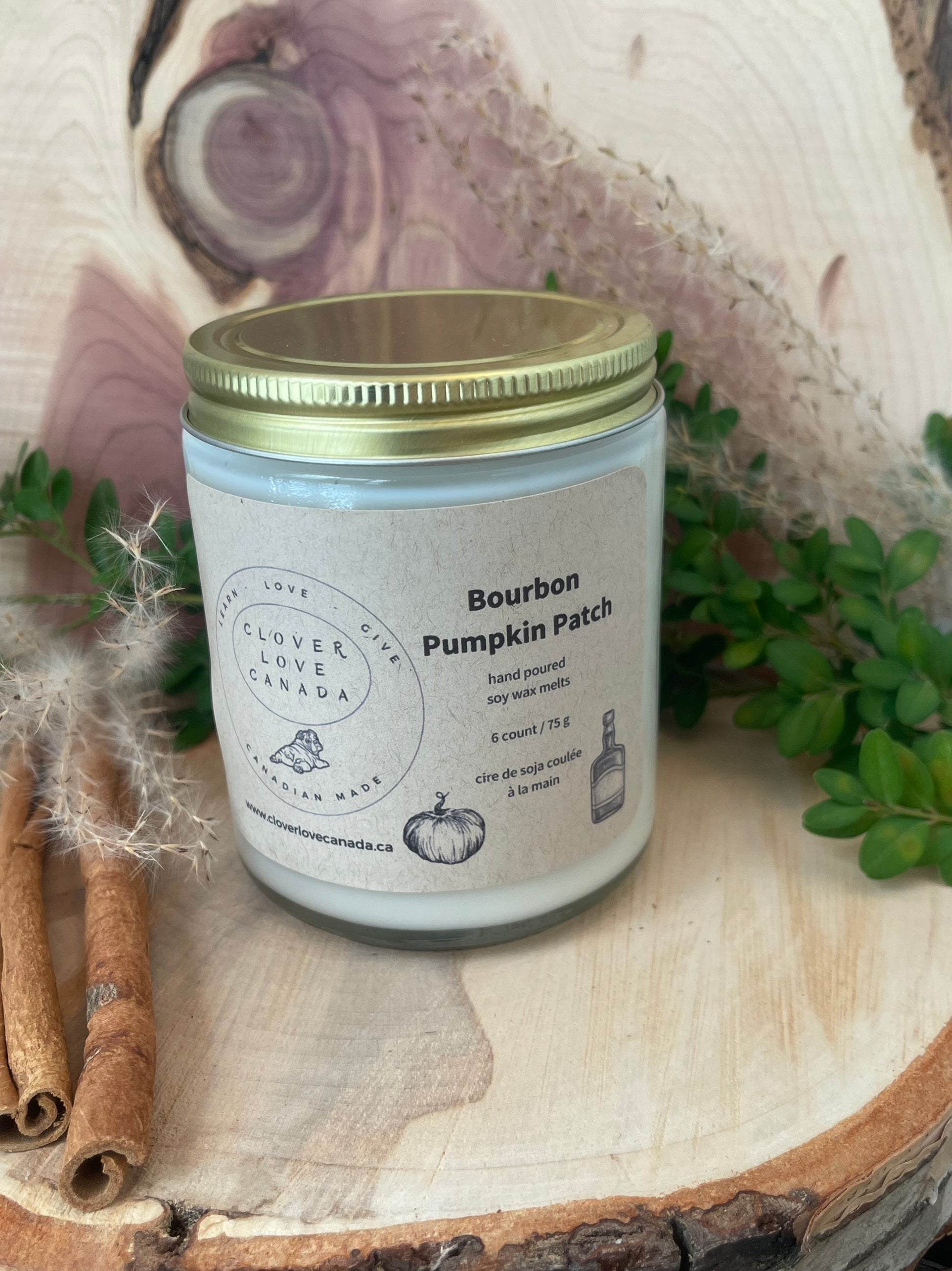 Bourbon Pumpkin Patch Hand Poured Soy Scented Candle 8 oz on birch wood slice 